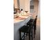 Kitchen island with seating for three, great for entertaining at 605 Oakpoint Cir, Davenport, FL 33837