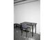 Small home office with a desk and chair at 605 Oakpoint Cir, Davenport, FL 33837