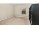 Empty bedroom with carpeted floor, window, and shelving unit at 400 Harbor Winds Ct, Winter Springs, FL 32708
