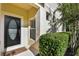 Black front door with glass accents and a small mat at 400 Harbor Winds Ct, Winter Springs, FL 32708