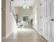 Entryway with tile flooring, and a view into the living room at 400 Harbor Winds Ct, Winter Springs, FL 32708