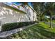 Sidewalk next to the house with green grass at 400 Harbor Winds Ct, Winter Springs, FL 32708