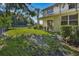 Backyard with grassy area and patio at 400 Harbor Winds Ct, Winter Springs, FL 32708