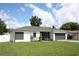 Modern two-bedroom house with gray and white exterior at 1148 Bancroft St, Deltona, FL 32725