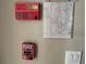 Image of fire alarm panel and control box at 185 Winding Cove Ave, Apopka, FL 32703