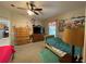 A bedroom with twin beds, dresser, and fun wall decor at 185 Winding Cove Ave, Apopka, FL 32703