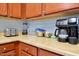 Kitchen features coffee maker, toaster, and blender at 3174 Feltrim Pl # 104, Kissimmee, FL 34747