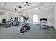 Community fitness center with cardio and weight equipment at 3174 Feltrim Pl # 104, Kissimmee, FL 34747