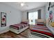 Mickey Mouse-themed bedroom with twin beds at 3174 Feltrim Pl # 104, Kissimmee, FL 34747
