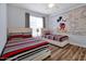 Mickey Mouse-themed bedroom with twin beds at 3174 Feltrim Pl # 104, Kissimmee, FL 34747