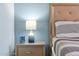 Nightstand with lamp and candle at 3174 Feltrim Pl # 104, Kissimmee, FL 34747