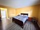 Bright bedroom with a double bed and ensuite bathroom access at 4099 Dijon Dr # 4099H, Orlando, FL 32808