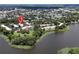 Aerial view showing community location by lake at 4099 Dijon Dr # 4099H, Orlando, FL 32808