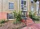 Attractive building exterior with landscaping at 4099 Dijon Dr # 4099H, Orlando, FL 32808
