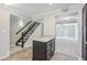 Kitchen with dark cabinetry, a breakfast bar, and view to living room at 1930 Conway Rd # 6, Orlando, FL 32812