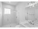 Clean bathroom, featuring a shower and modern vanity at 197 Valencia Ridge Dr, Auburndale, FL 33823