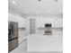 Modern kitchen with white cabinets and stainless steel appliances at 197 Valencia Ridge Dr, Auburndale, FL 33823