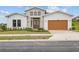 Modern two-story home with attached garage at 197 Valencia Ridge Dr, Auburndale, FL 33823