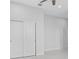 Bright bedroom with double doors and tile flooring at 197 Valencia Ridge Dr, Auburndale, FL 33823