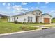 Modern two-story home with attached garage at 197 Valencia Ridge Dr, Auburndale, FL 33823