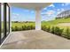 Covered patio overlooking a green backyard at 197 Valencia Ridge Dr, Auburndale, FL 33823