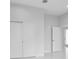 Bright bedroom with double doors and tile flooring at 197 Valencia Ridge Dr, Auburndale, FL 33823