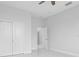 Bright bedroom with double doors and tile flooring at 197 Valencia Ridge Dr, Auburndale, FL 33823