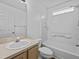 Bathroom with shower/tub combo and vanity at 2977 Kokomo Loop, Haines City, FL 33844