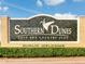 Southern Dunes Golf and Country Club entrance sign at 2977 Kokomo Loop, Haines City, FL 33844