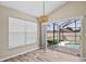 Bright breakfast nook with pool view and sliding glass doors at 2977 Kokomo Loop, Haines City, FL 33844
