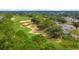 Aerial view of golf course and neighborhood at 2977 Kokomo Loop, Haines City, FL 33844