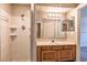 Bathroom includes a shower/tub combo and wood vanity at 3043 Antique Oaks Cir # 171, Winter Park, FL 32792