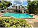 Community pool with plenty of space for relaxation at 3043 Antique Oaks Cir # 171, Winter Park, FL 32792
