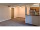 Dining area with kitchen pass-through and carpet at 3043 Antique Oaks Cir # 171, Winter Park, FL 32792