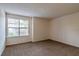 Well-lit bedroom with carpet flooring and a large window at 3043 Antique Oaks Cir # 171, Winter Park, FL 32792