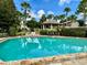 Inviting community swimming pool with surrounding landscaping at 3043 Antique Oaks Cir # 171, Winter Park, FL 32792