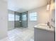Modern bathroom with double vanity and large glass shower at 2405 Boy Scout Rd, Apopka, FL 32703