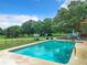 Inviting rectangular pool with ample surrounding yard space at 2405 Boy Scout Rd, Apopka, FL 32703