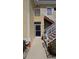 Exterior view of condo building showing entrance and staircase at 14102 Indian Creek Dr, Kissimmee, FL 34759