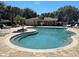 Inviting community pool with lounge chairs and a clubhouse in the background at 14102 Indian Creek Dr, Kissimmee, FL 34759