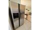 Stainless steel refrigerator with ice and water dispenser at 14102 Indian Creek Dr, Kissimmee, FL 34759
