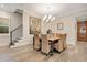 Elegant dining room features a chandelier and hardwood floors at 4118 Isle Vista Ave, Belle Isle, FL 32812
