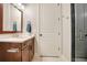 Elegant bathroom with a double vanity and walk-in shower at 4118 Isle Vista Ave, Belle Isle, FL 32812