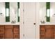 Double vanity bathroom with a shared center access at 4118 Isle Vista Ave, Belle Isle, FL 32812