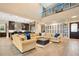 Spacious living room with high ceilings and a large sectional sofa at 4118 Isle Vista Ave, Belle Isle, FL 32812