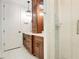 Modern bathroom with double vanity and a frameless shower at 4118 Isle Vista Ave, Belle Isle, FL 32812