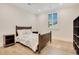 Cozy bedroom with wood flooring and a full-size bed at 4118 Isle Vista Ave, Belle Isle, FL 32812
