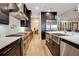 Gourmet kitchen boasts stainless steel appliances and expansive island at 4118 Isle Vista Ave, Belle Isle, FL 32812