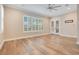 Bright bedroom featuring hardwood floors and french doors at 4118 Isle Vista Ave, Belle Isle, FL 32812