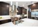 Modern kitchen features stainless steel sink and appliances at 4118 Isle Vista Ave, Belle Isle, FL 32812